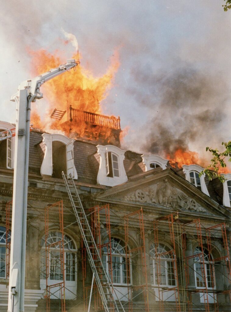 The May 12, 1988, fire at the Cabildo engulfed the entire roof. Photo courtesy of the Collections of the Louisiana State Museum.