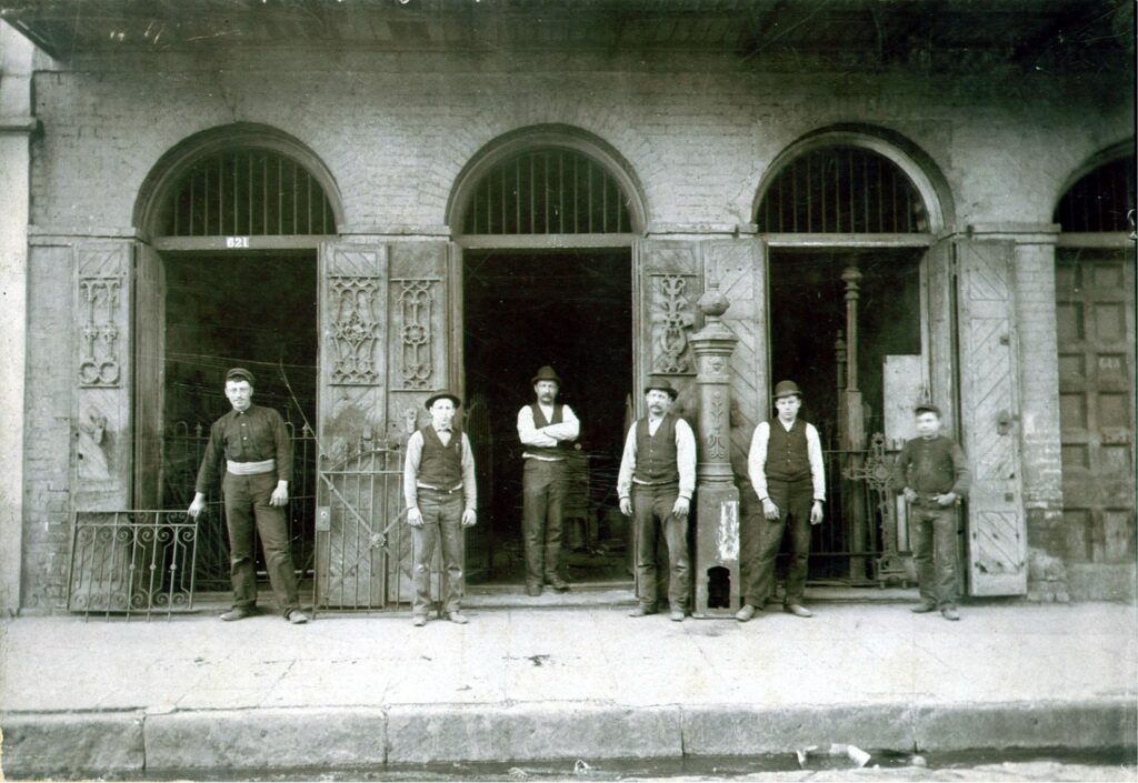 Charles Mangin’s ironworks at 621 Bourbon Street in 1885. Mangin is third from the left. Photo courtesy Roy Arrigo.